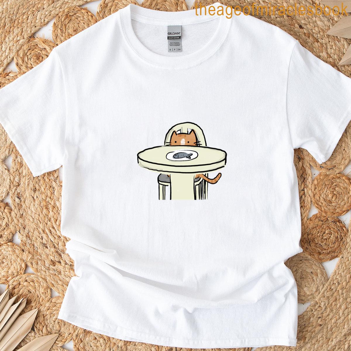 An Orange Cat Behind The Table T-shirt