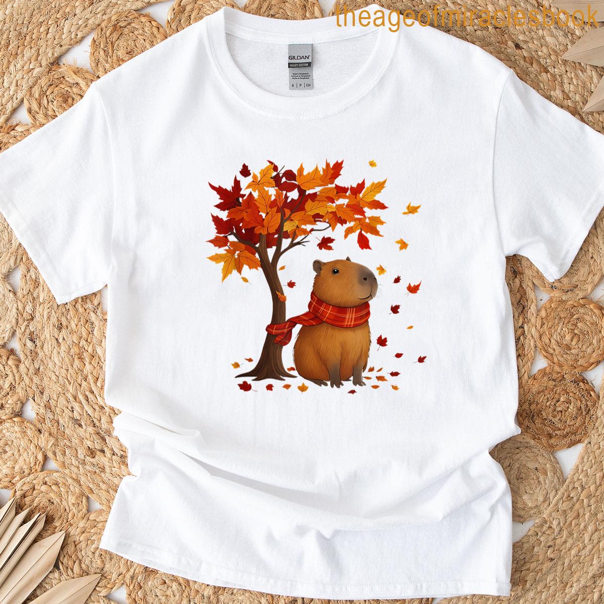 Capybara In Autumn Leaves Under A Leaf Fall Tree T-shirt